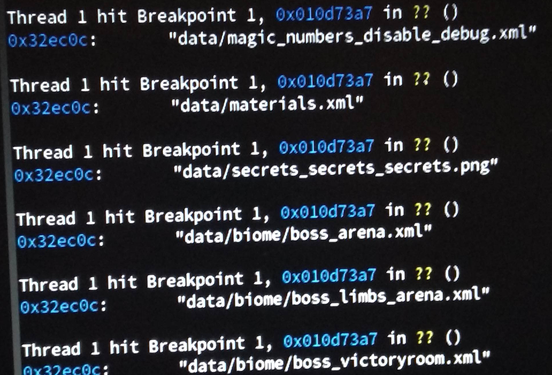 Output of GDB where the same breakpoint gets hit multiple times.
file names such as materials.xml are printed to the console.
